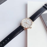 Gucci G-Timeless Mother of Pearl Dial Black Leather Strap Watch For Women - YA126589